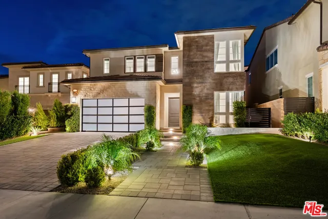 a view of hallway with wooden floor