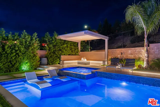 a view of a livingroom with wooden floor