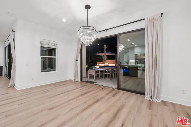 a bathroom with a toilet sink and a mirror