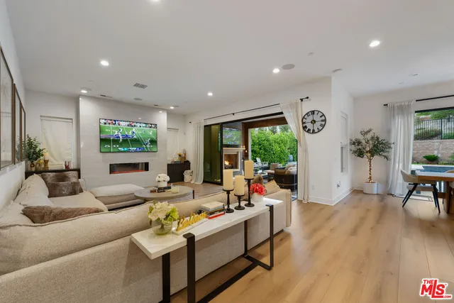 a kitchen with stainless steel appliances granite countertop a stove and a sink