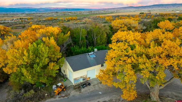 an aerial view of a houses with outdoor space