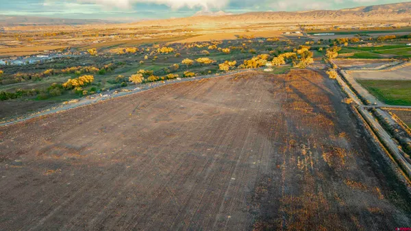 a view of an ocean and a mountain