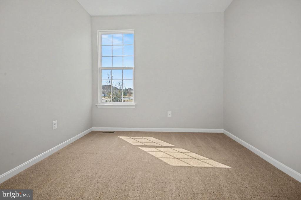 137 Silver Maple Road Middletown, DE 19709 - Photo 12 of 21 an empty room with a window