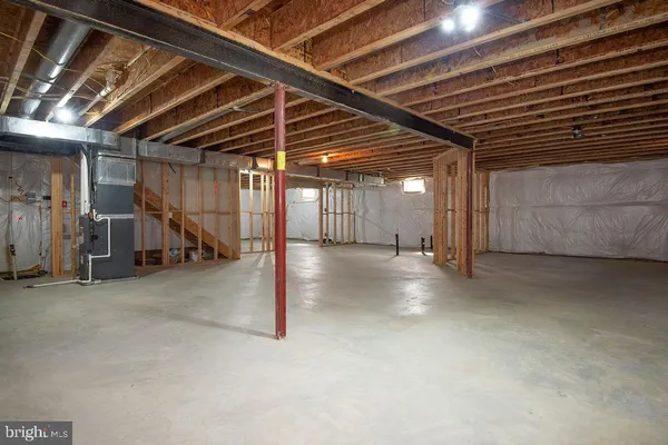 a view of an empty room with stairs