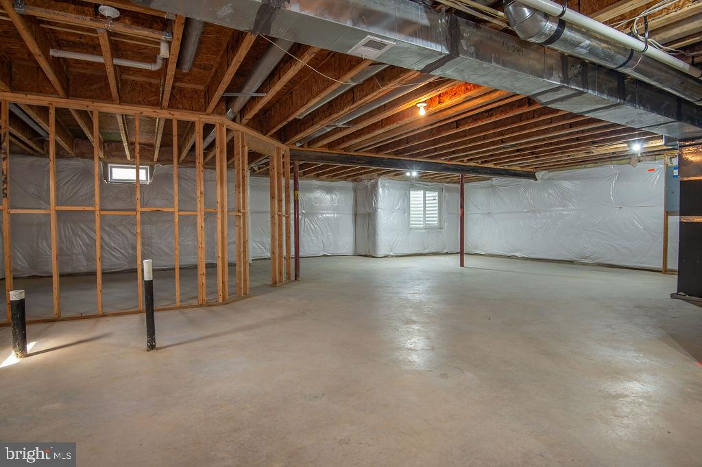 137 Silver Maple Road Middletown, DE 19709 - Photo 18 of 25 a view of an empty room with stairs