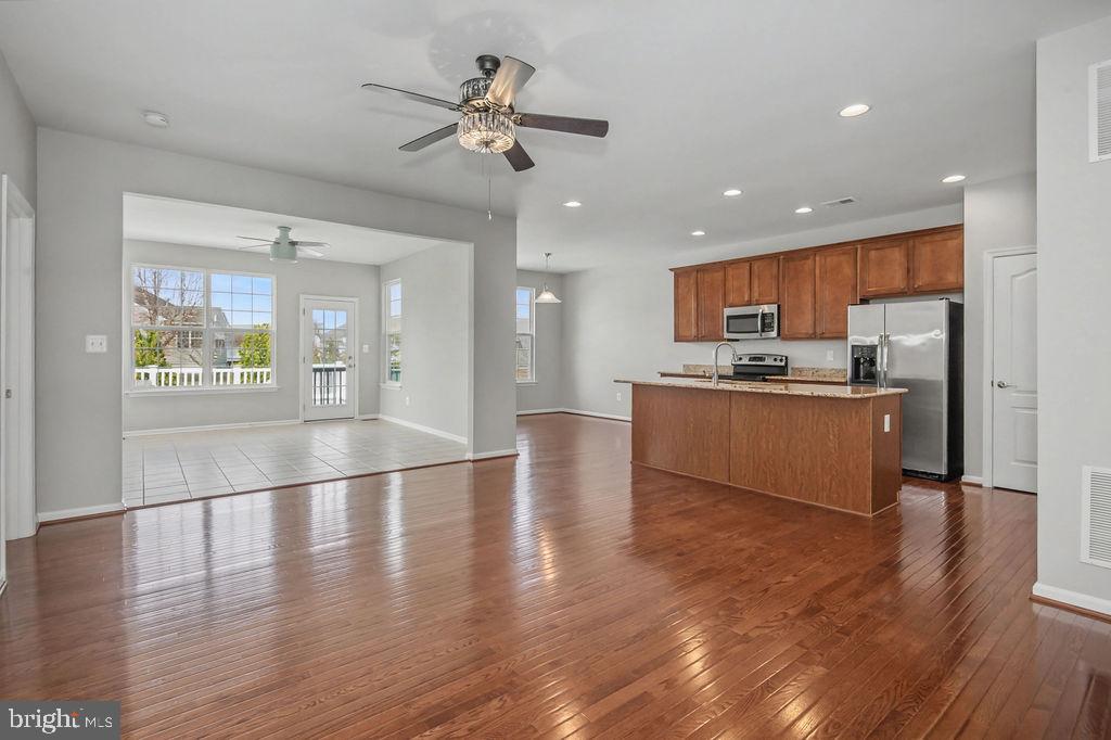 137 Silver Maple Road Middletown, DE 19709 - Photo 21 of 21 a view of kitchen with cabinets and wooden floor