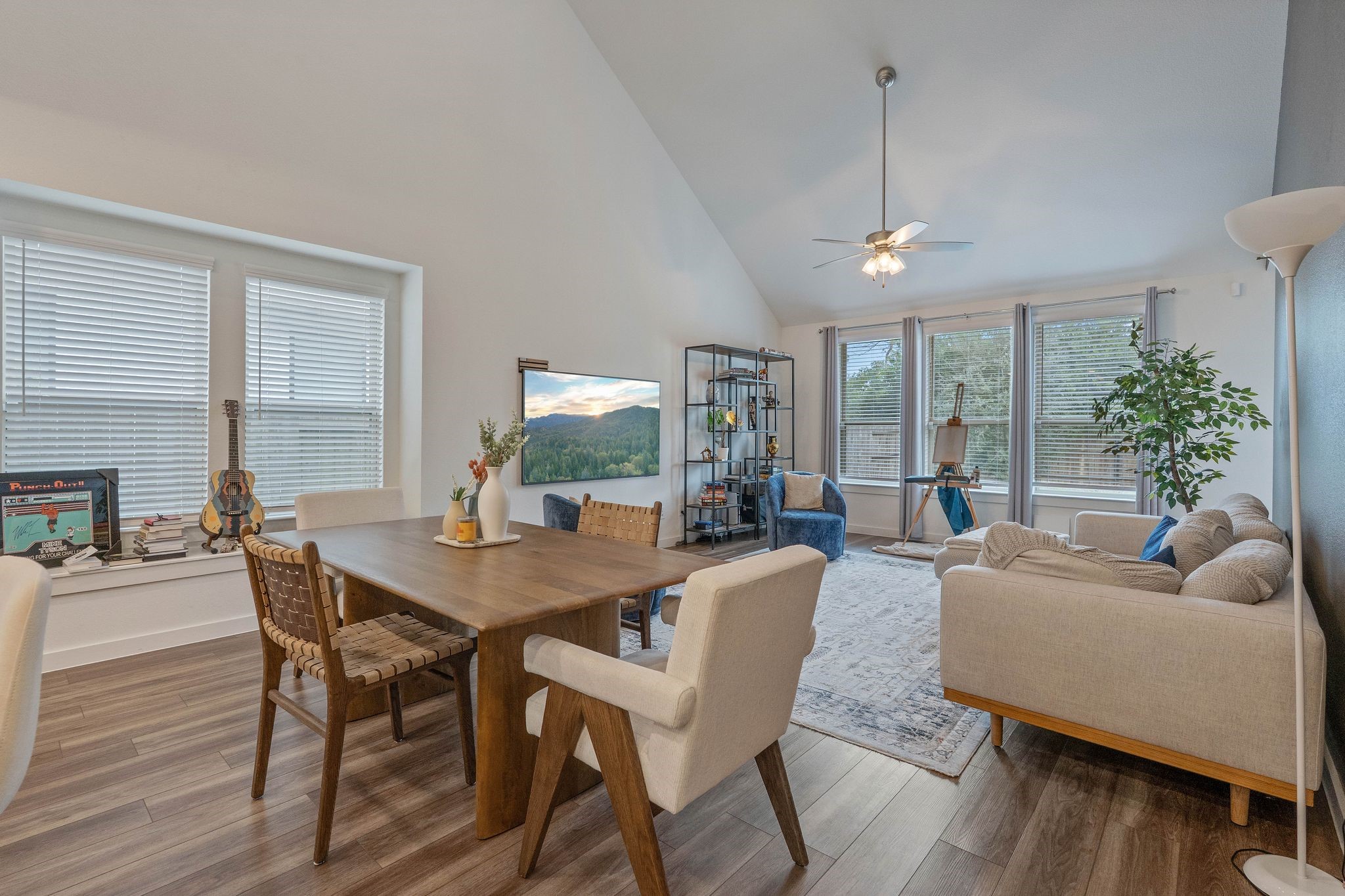 509 Timber Voyage Court Conroe, TX 77304 - Photo 12 of 36 a view of a dining room with furniture window and wooden floor