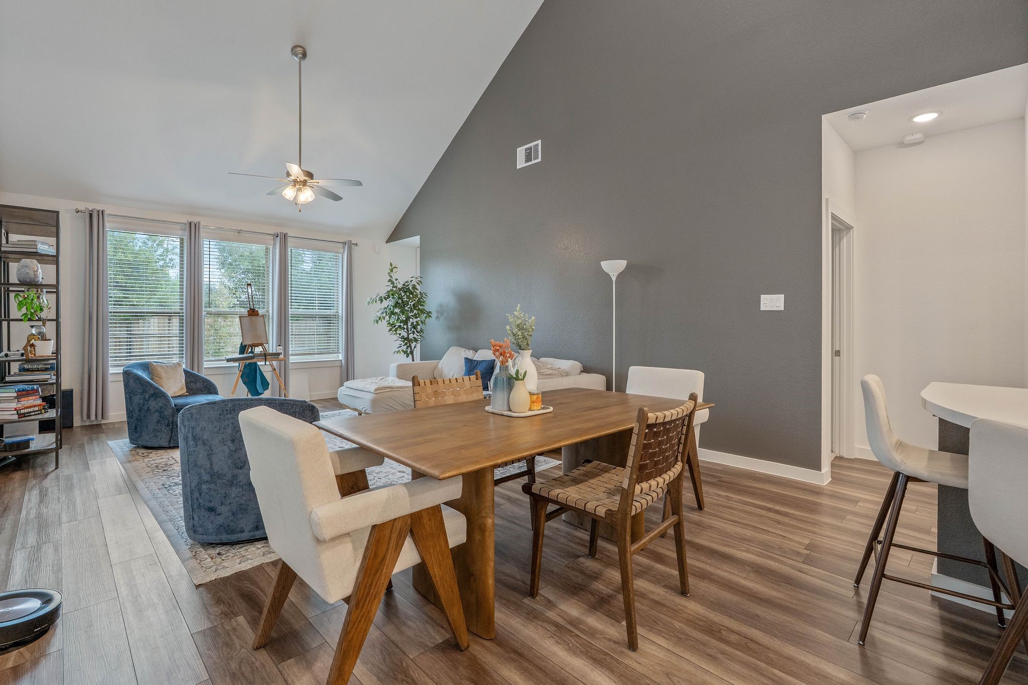 509 Timber Voyage Court Conroe, TX 77304 - Photo 13 of 36 a view of a dining room with furniture window and wooden floor
