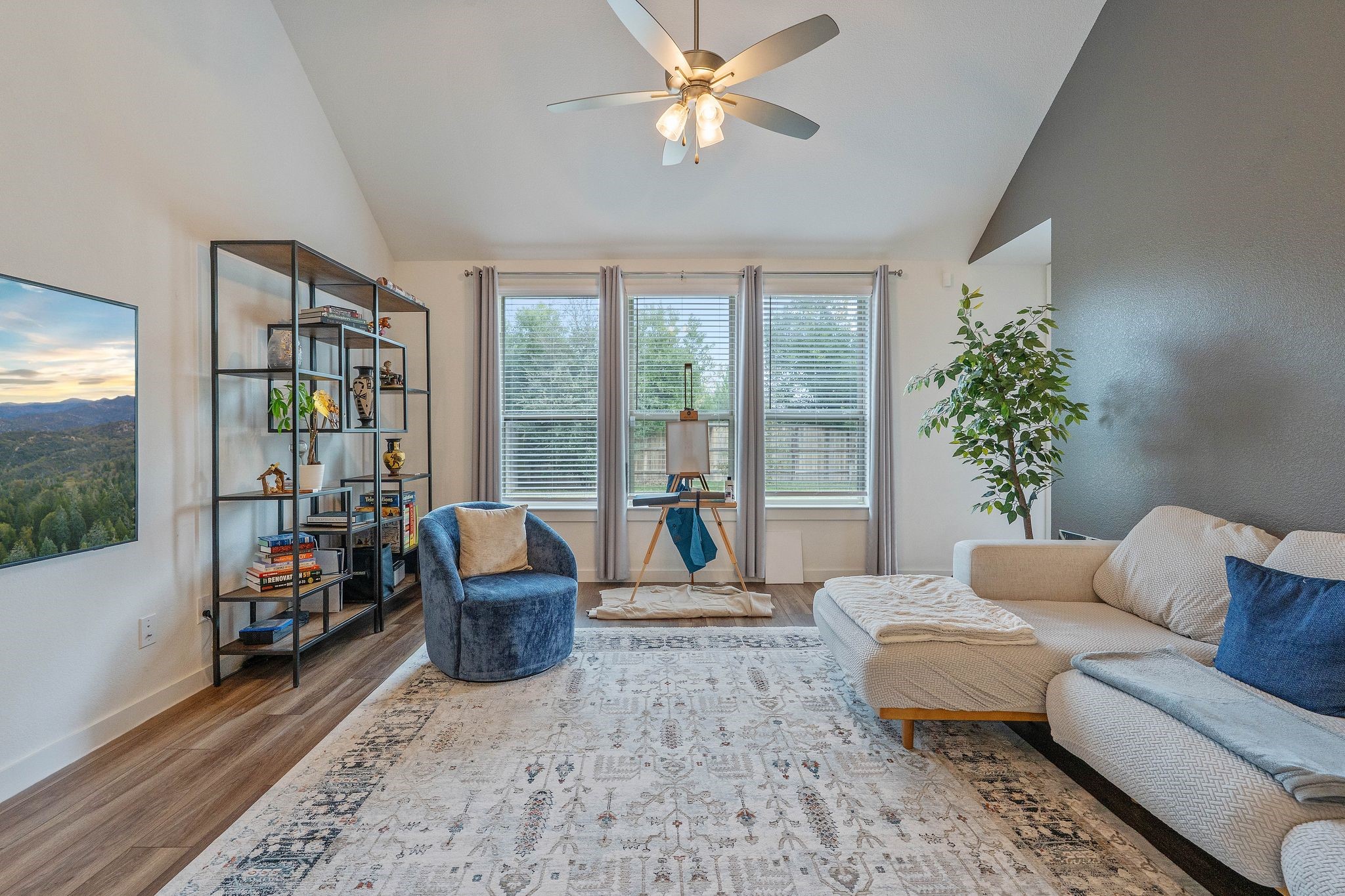 509 Timber Voyage Court Conroe, TX 77304 - Photo 16 of 36 a living room with furniture and a large window