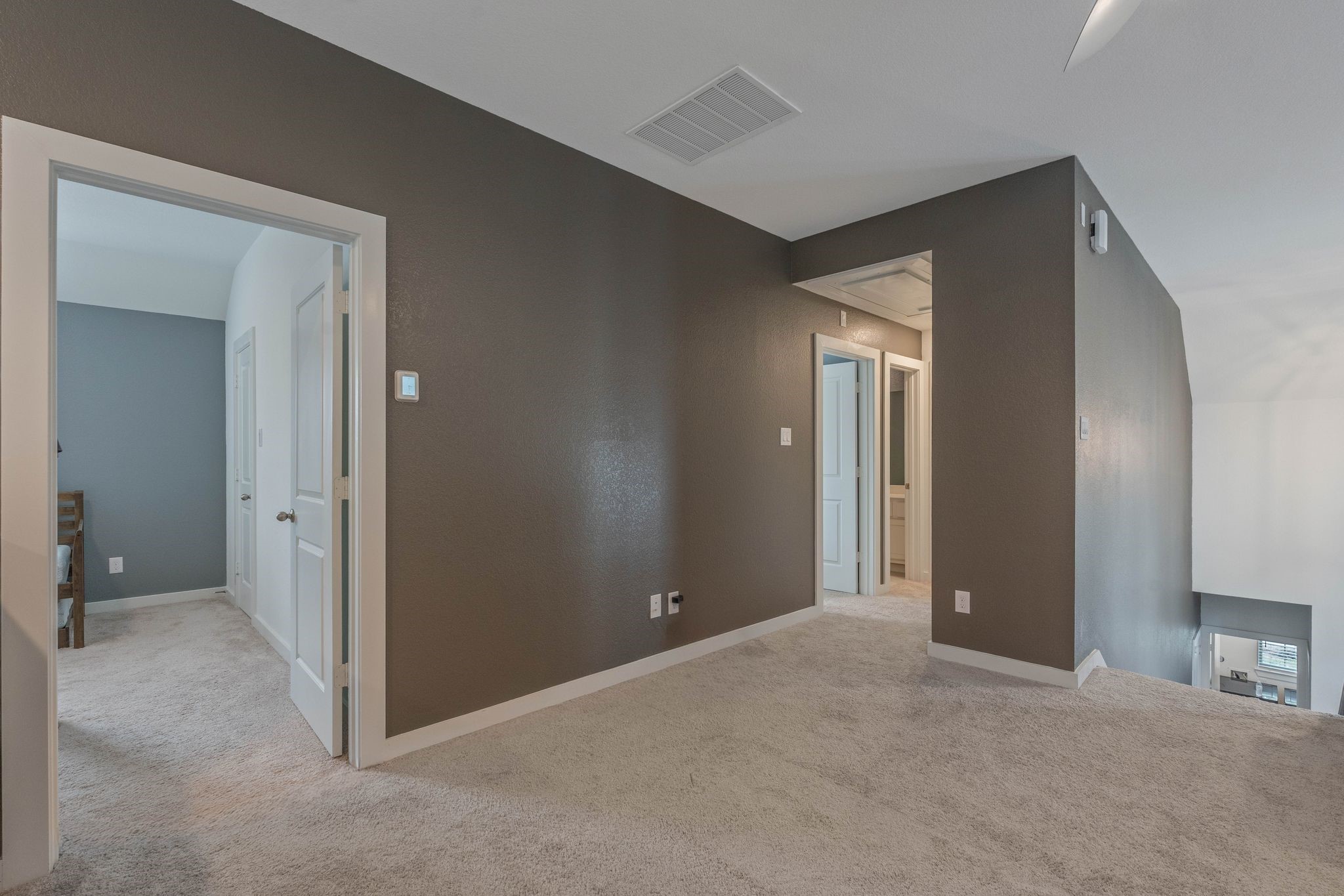 509 Timber Voyage Court Conroe, TX 77304 - Photo 18 of 36 an empty room with closet and a bathroom