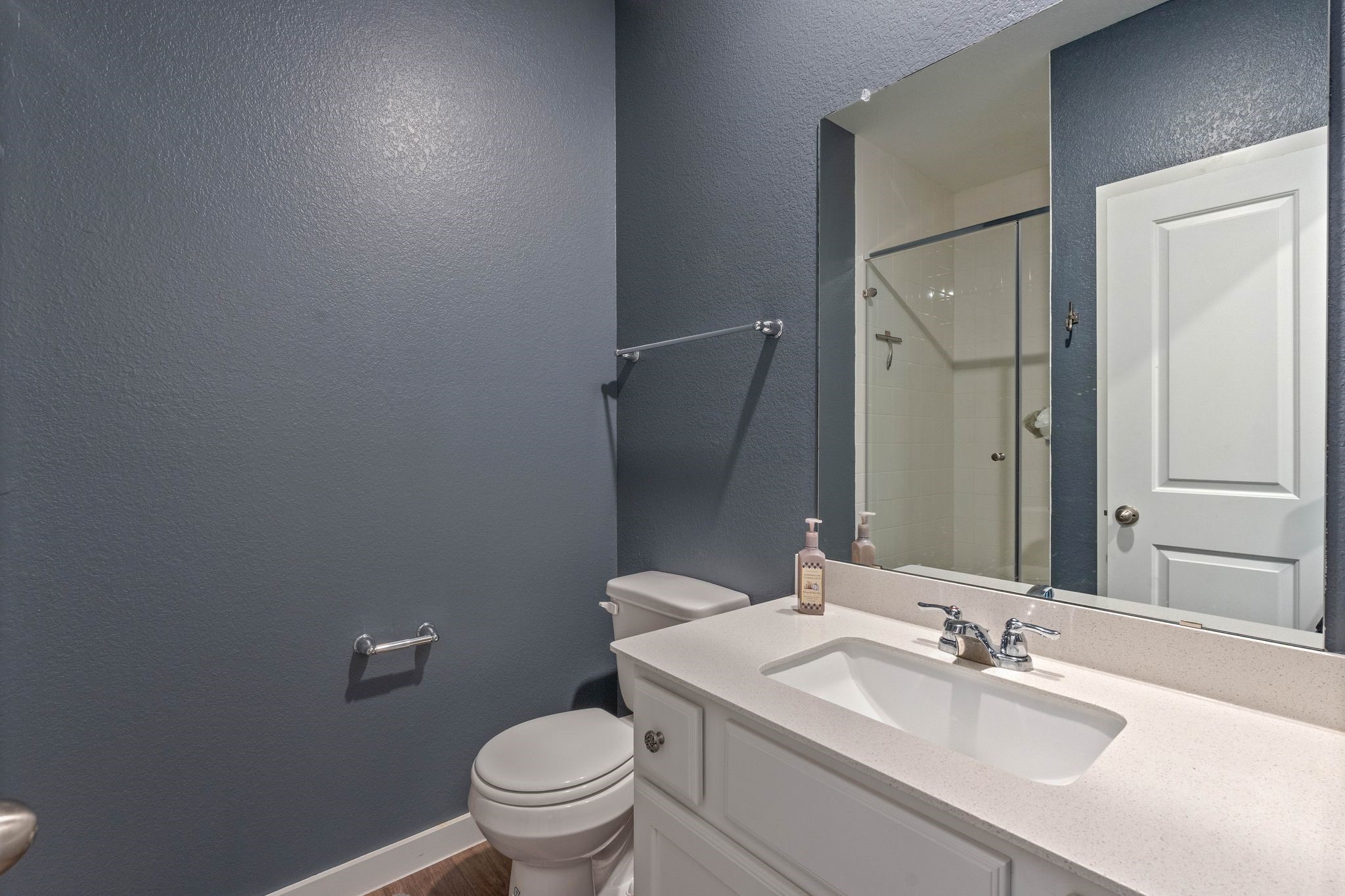 509 Timber Voyage Court Conroe, TX 77304 - Photo 28 of 36 a bathroom with a sink toilet and vanity