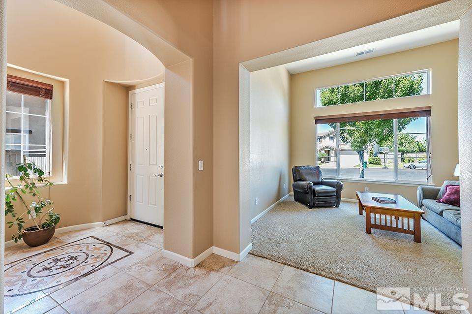 580 Secretariat Court Reno, NV 89521 - Photo 5 of 25 a living room with furniture and a window