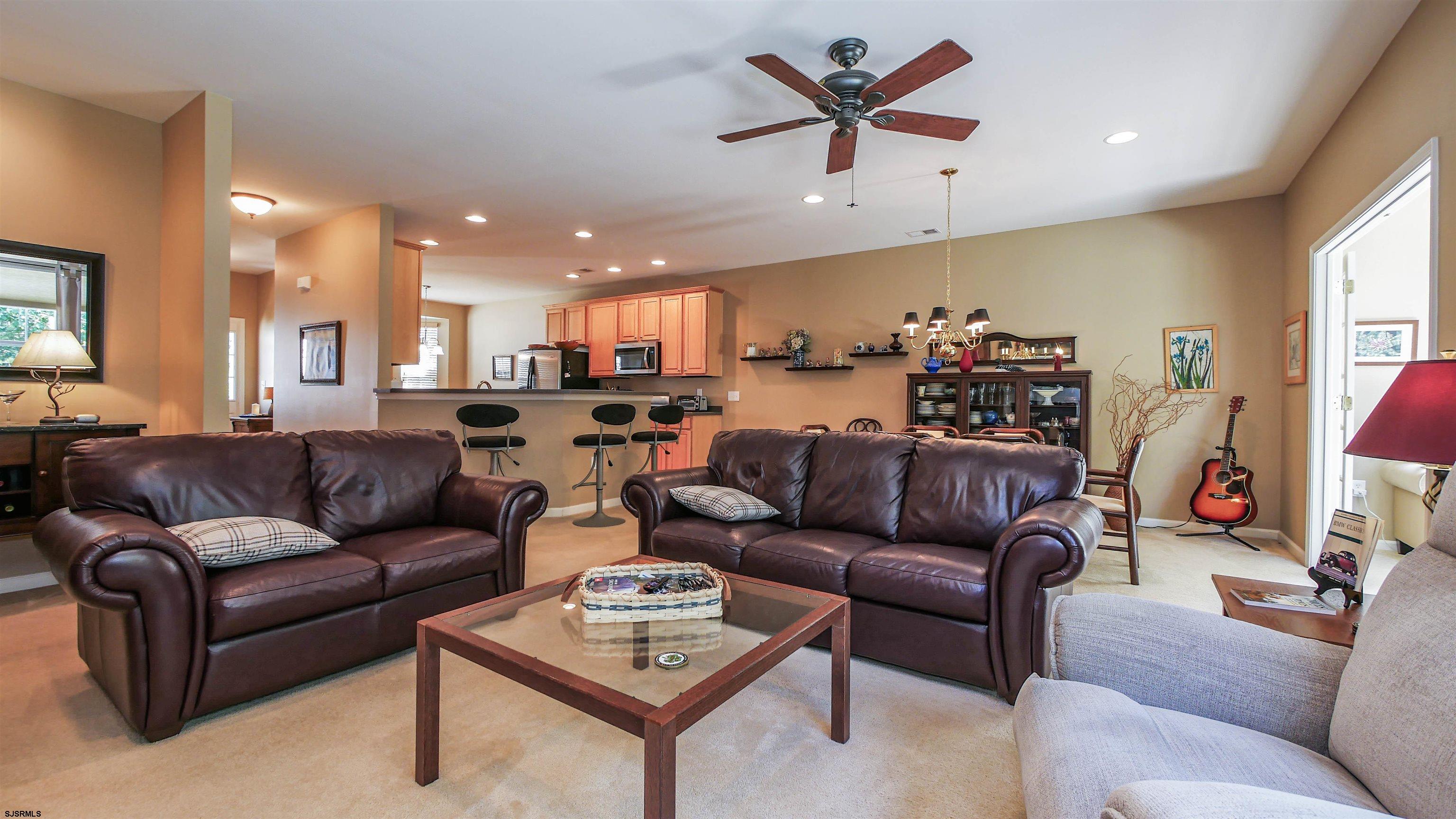 33 Brampton Street Smithville, NJ 08205 - Photo 17 of 37 a living room with furniture kitchen and a window