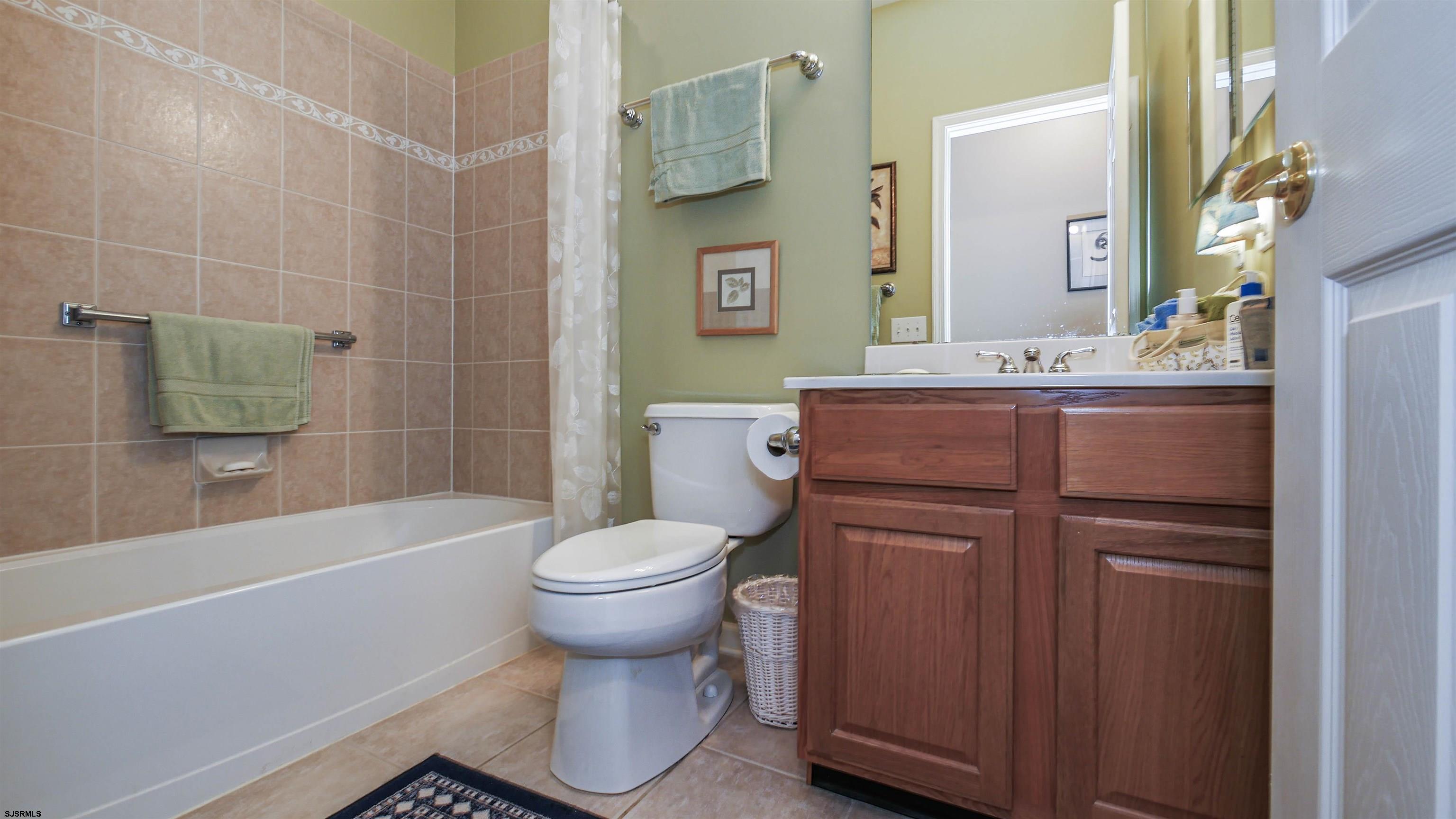 33 Brampton Street Smithville, NJ 08205 - Photo 24 of 37 a bathroom with a sink toilet and shower