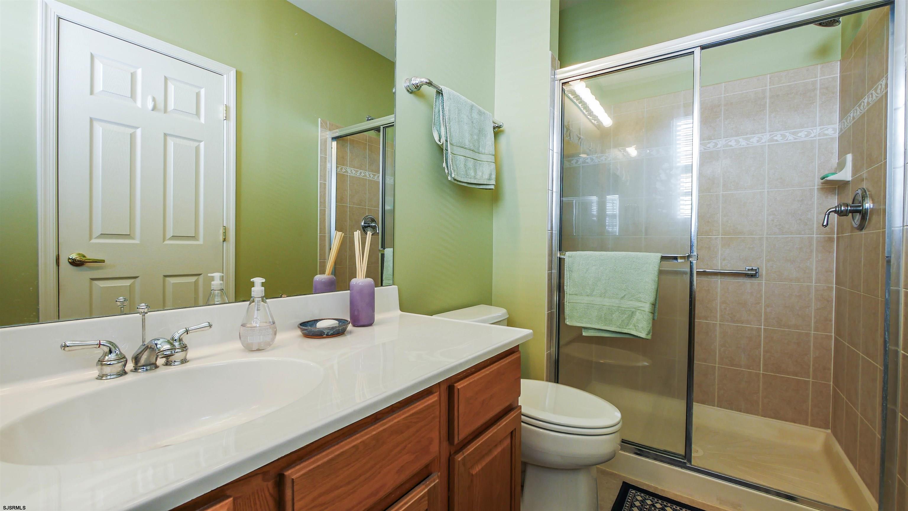 33 Brampton Street Smithville, NJ 08205 - Photo 29 of 37 a bathroom with a sink toilet and shower