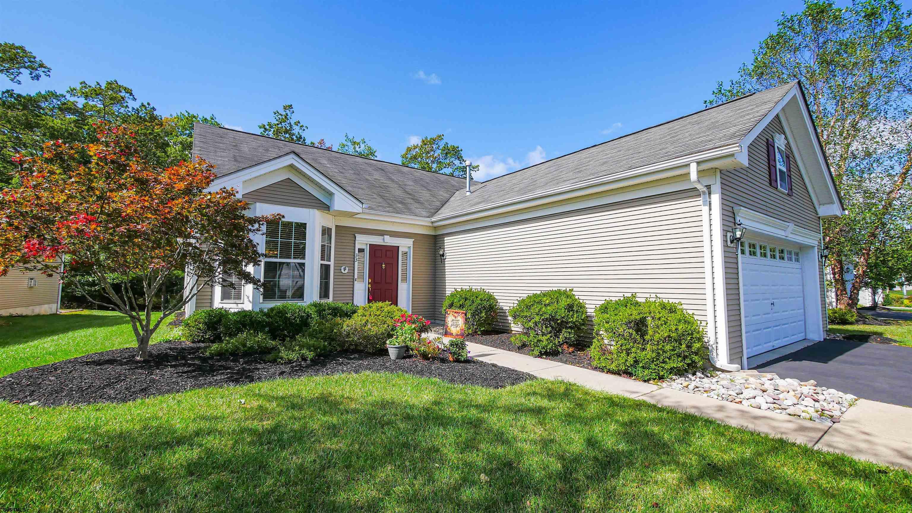 33 Brampton Street Smithville, NJ 08205 - Photo 4 of 37 a front view of a house with garden