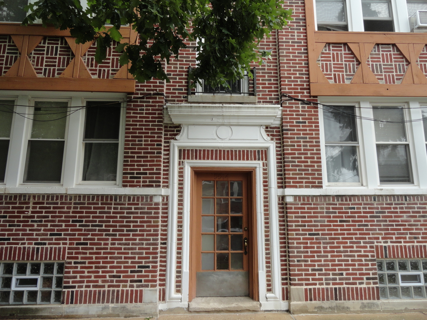 5514 West George Street Chicago, IL 60641 - Photo 3 of 9 a view of a brick building with many windows