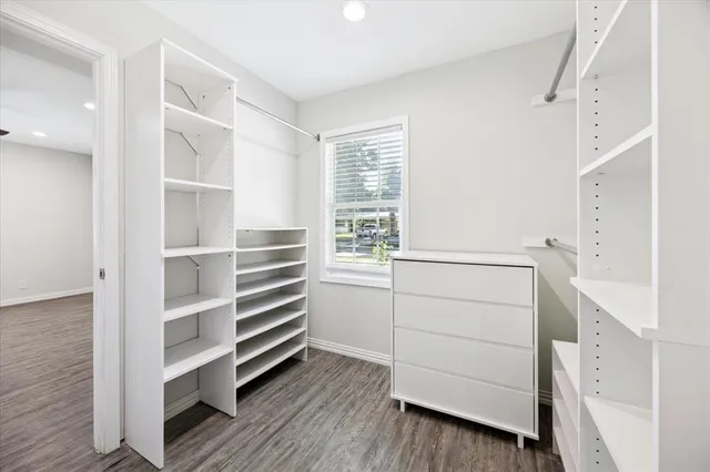 a view of an empty walk in closet