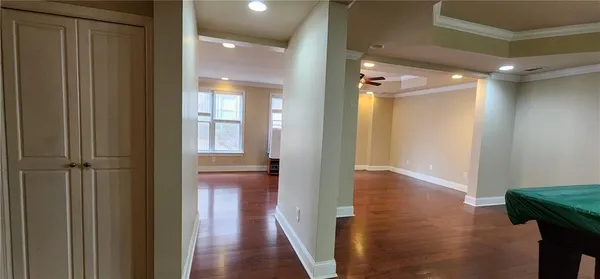 a view of hallway with livingroom