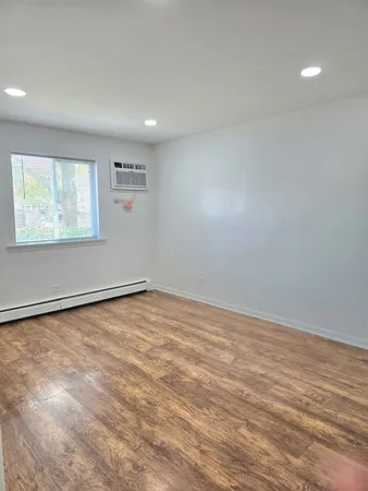 an empty room with a workbench