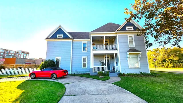 a front view of a house with yard
