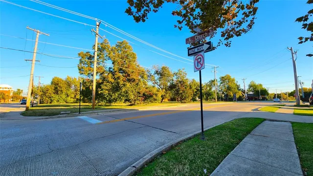 a view of a swimming pool with a yard