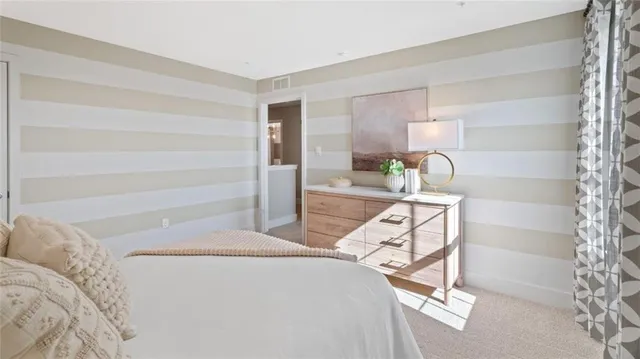 a view of a living room and bathroom