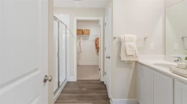 a bathroom with a sink and mirror