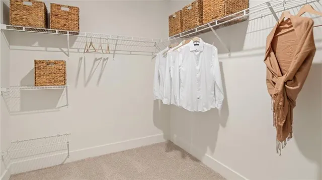 a view of a small space with racks on the wall