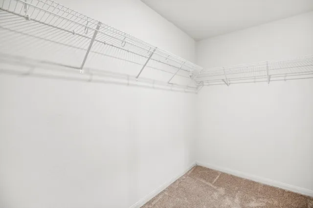 a view of a room with racks on the wall