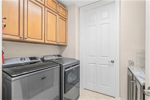 a utility room with washer and dryer