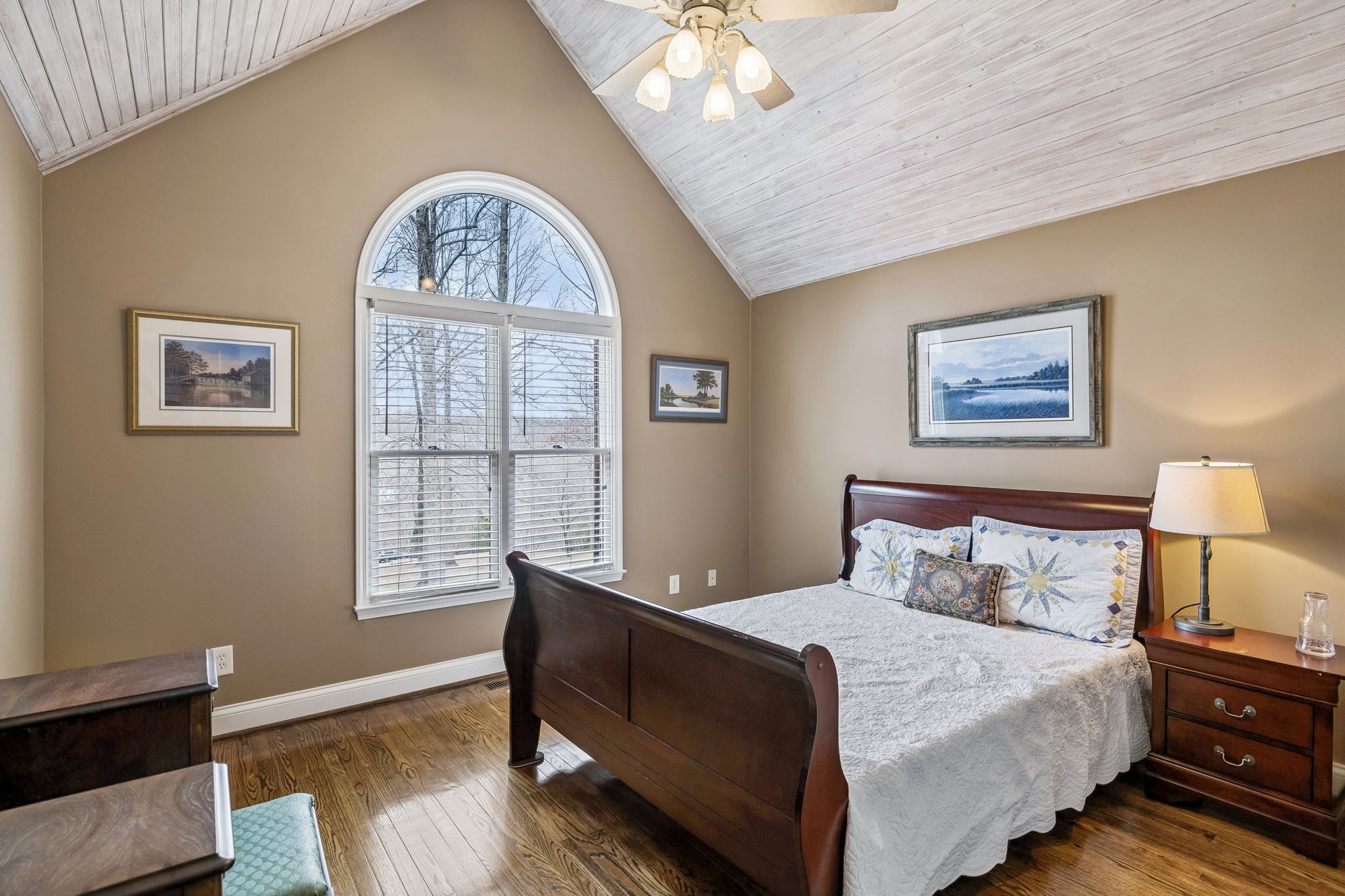 7301 Brush Creek Road Fairview, TN 37062 - Photo 13 of 30 a bedroom with a bed and a painting on the wall