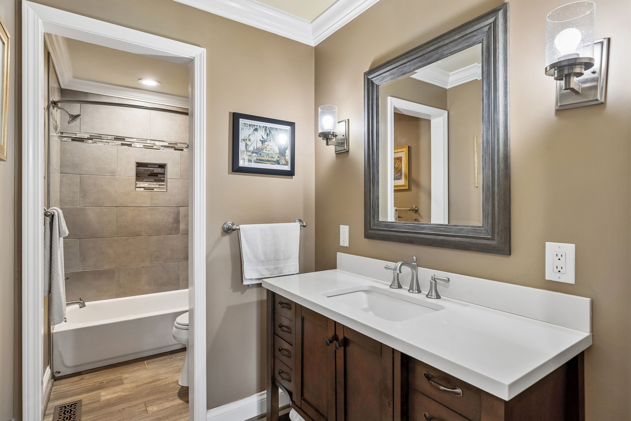 7301 Brush Creek Road Fairview, TN 37062 - Photo 15 of 30 a bathroom with a sink vanity tub and a mirror
