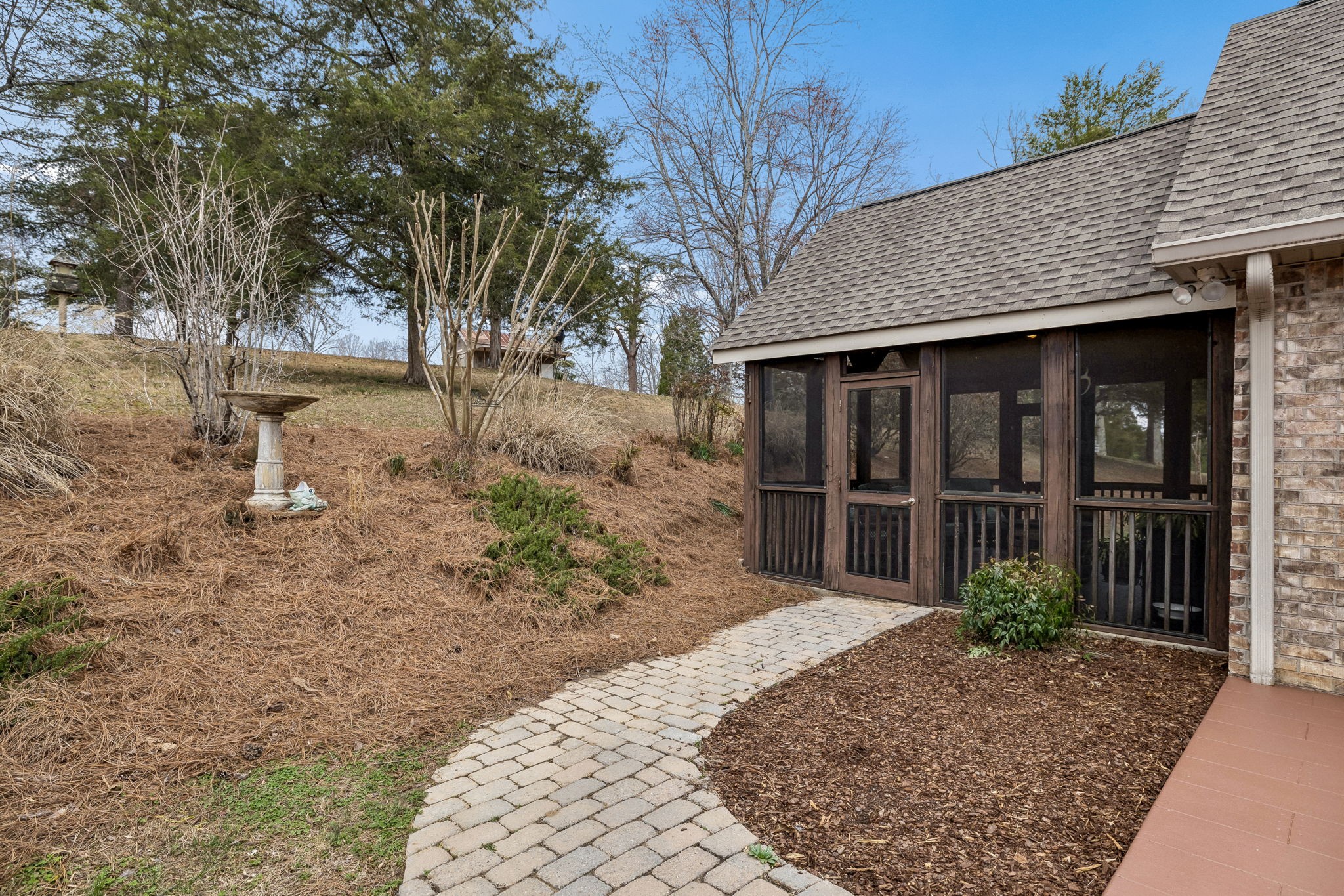 7301 Brush Creek Road Fairview, TN 37062 - Photo 21 of 30 a front view of a house with garden