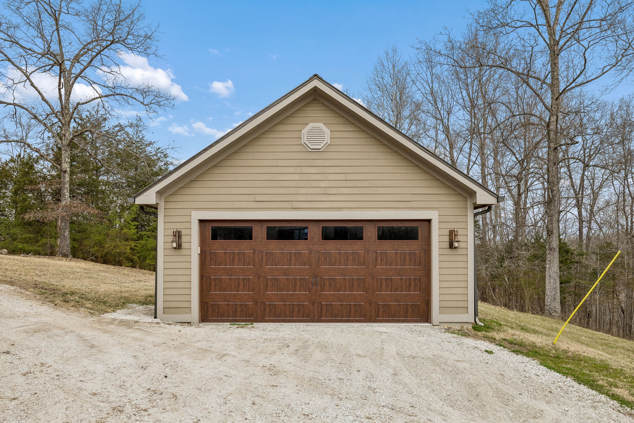 7301 Brush Creek Road Fairview, TN 37062 - Photo 23 of 30 a view of house with a yard and large tree