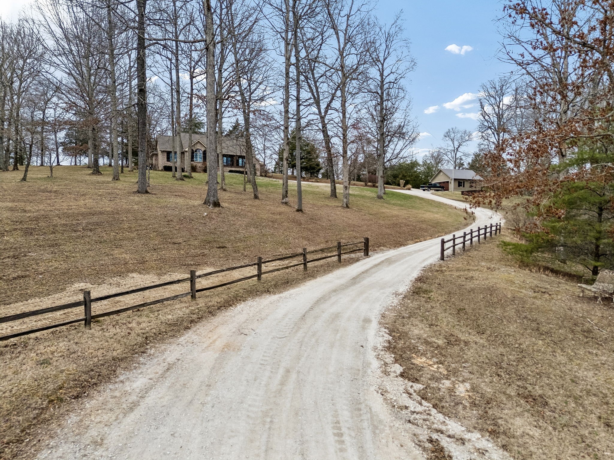 7301 Brush Creek Road Fairview, TN 37062 - Photo 26 of 30 a view of outdoor space with deck and trees