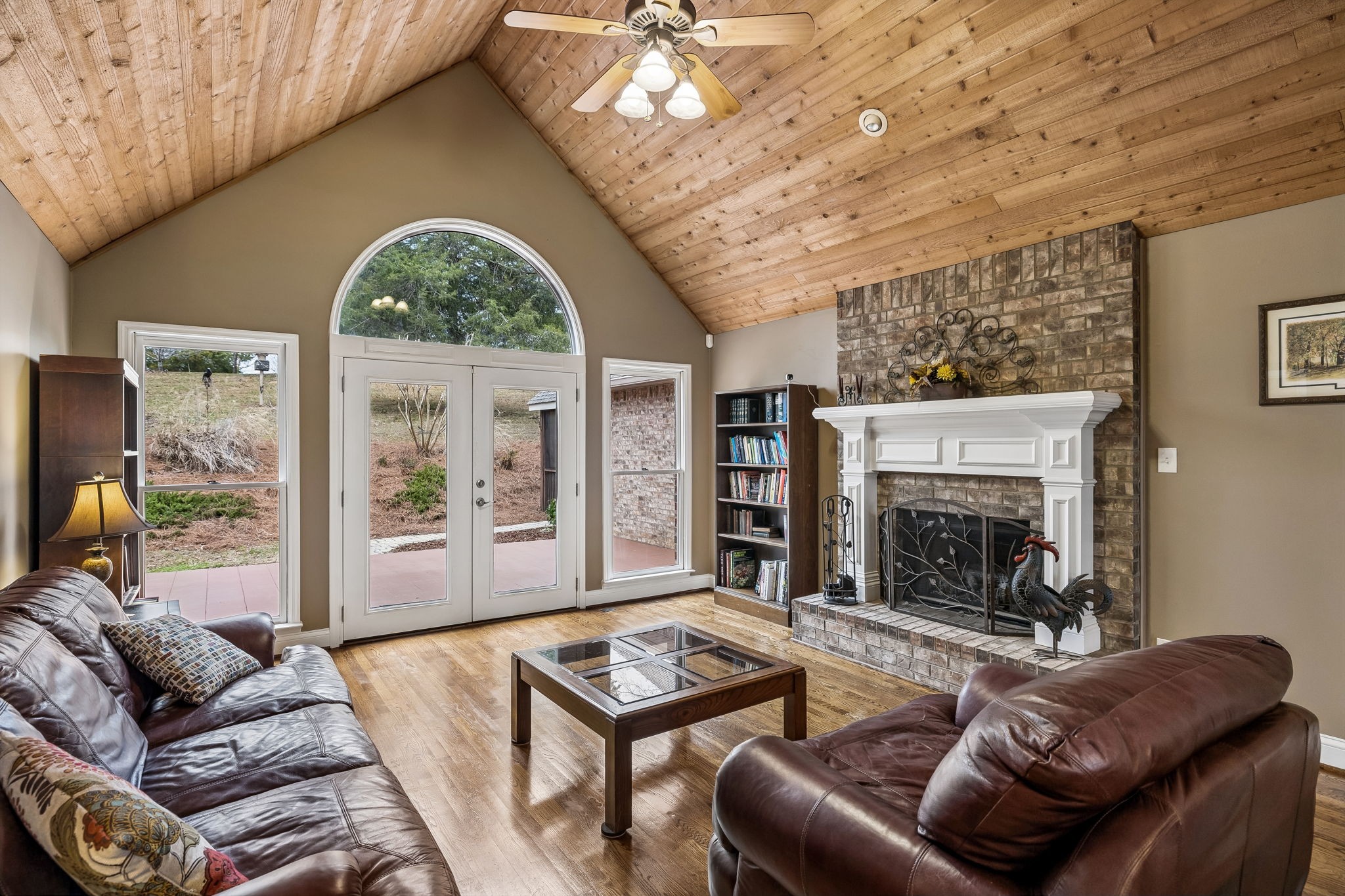 7301 Brush Creek Road Fairview, TN 37062 - Photo 3 of 30 a living room with furniture and a fireplace