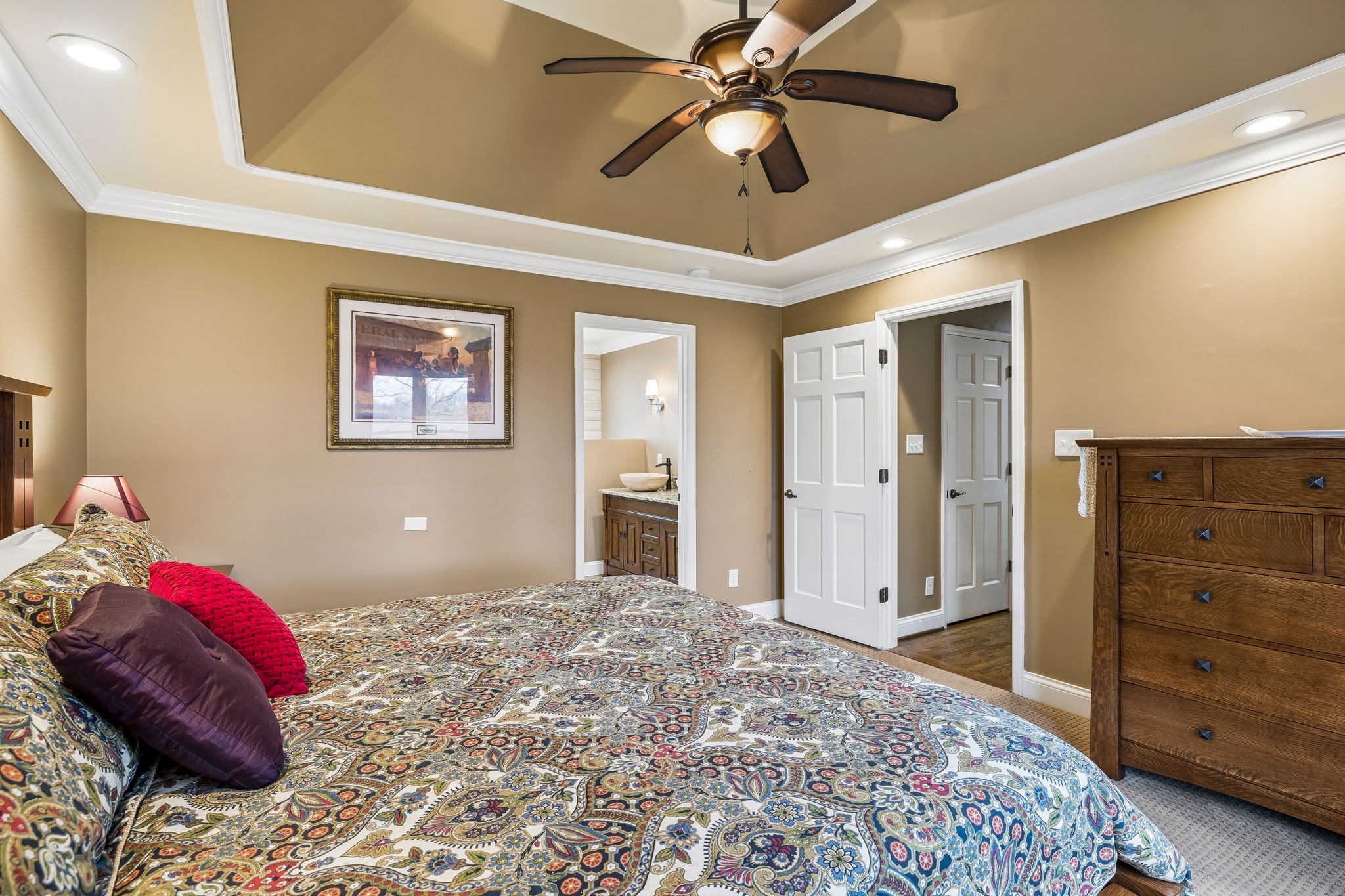 7301 Brush Creek Road Fairview, TN 37062 - Photo 10 of 30 a bedroom with a bed and a chandelier