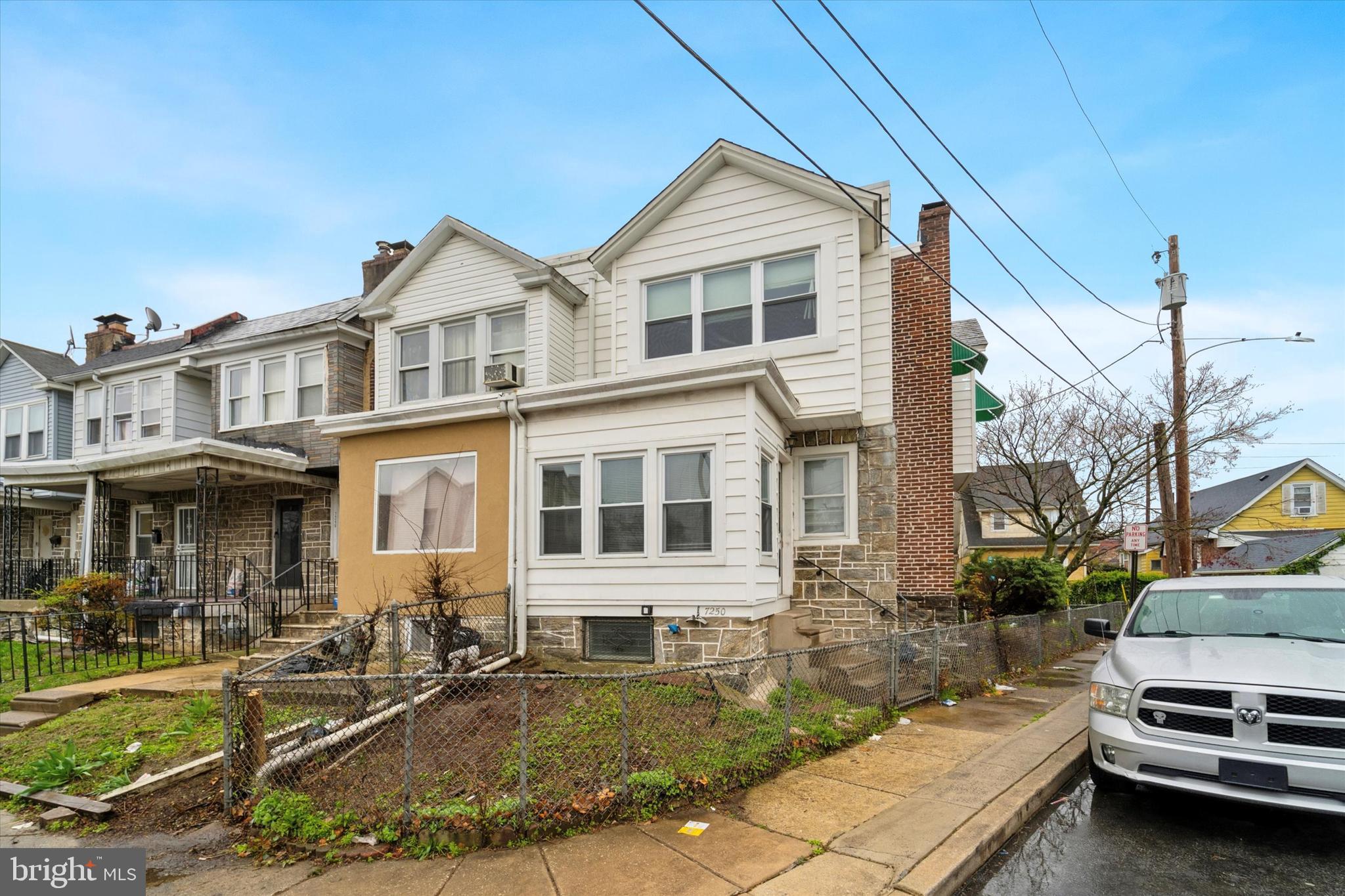 7250 Radbourne Road Upper Darby, PA 19082 - Photo 1 of 15 a front view of a house with a yard