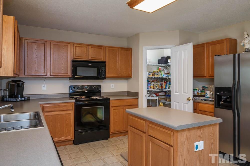 4238 Offshore Drive Raleigh, NC 27610 - Photo 8 of 25