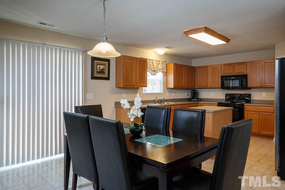 4238 Offshore Drive Raleigh, NC 27610 - Photo 9 of 25