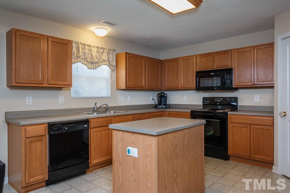 4238 Offshore Drive Raleigh, NC 27610 - Photo 10 of 25