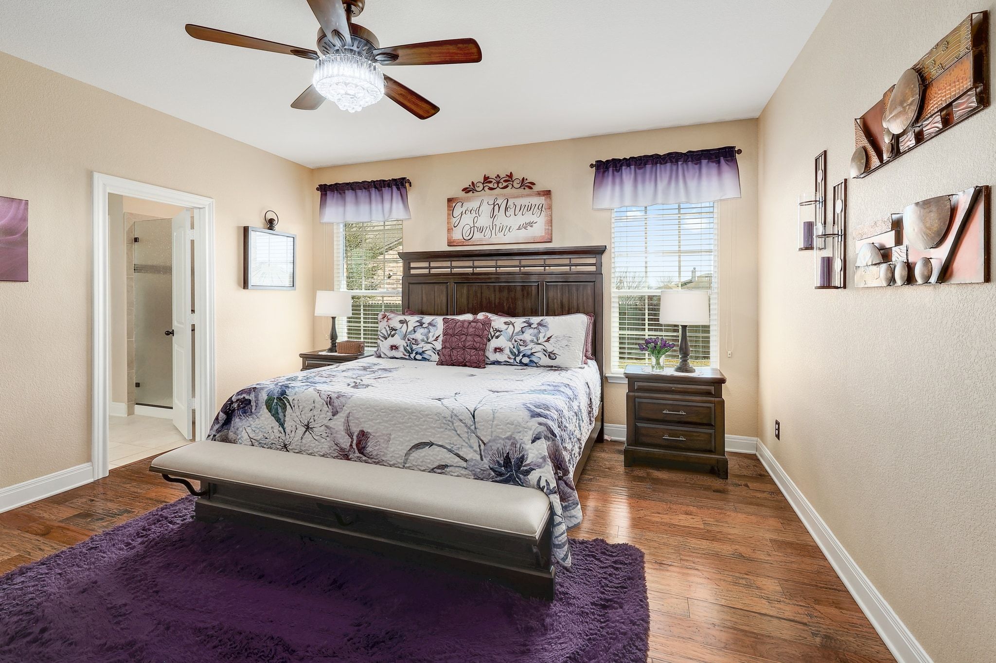 646 Landon Samuel Loop Pflugerville, TX 78660 - Photo 21 of 40 a bedroom with a bed and wooden floor