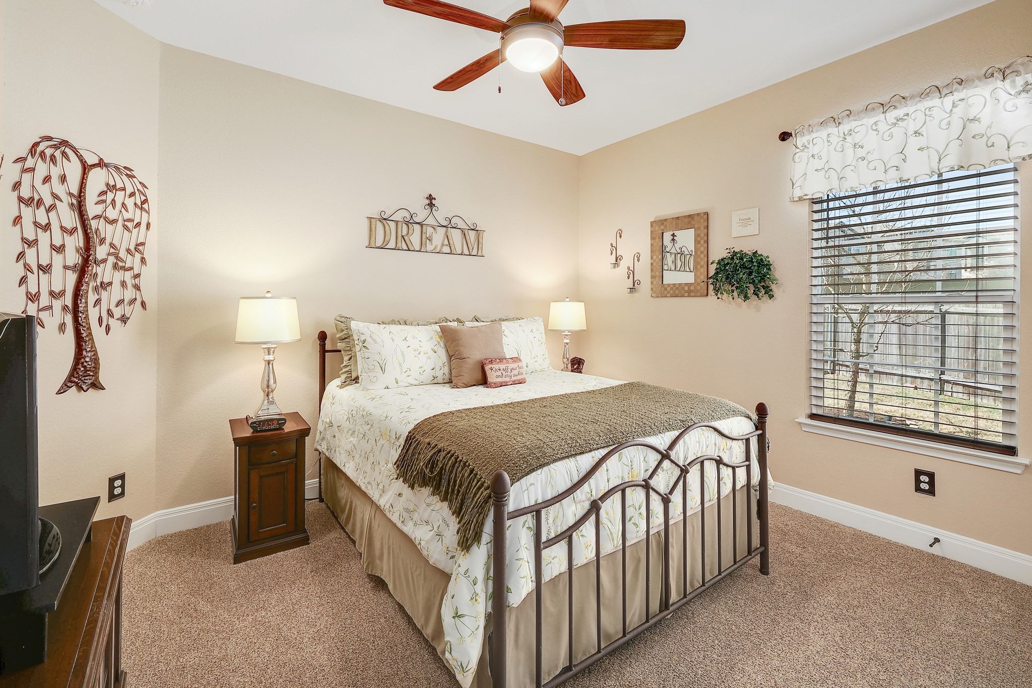 646 Landon Samuel Loop Pflugerville, TX 78660 - Photo 27 of 40 a bedroom with a bed and a window