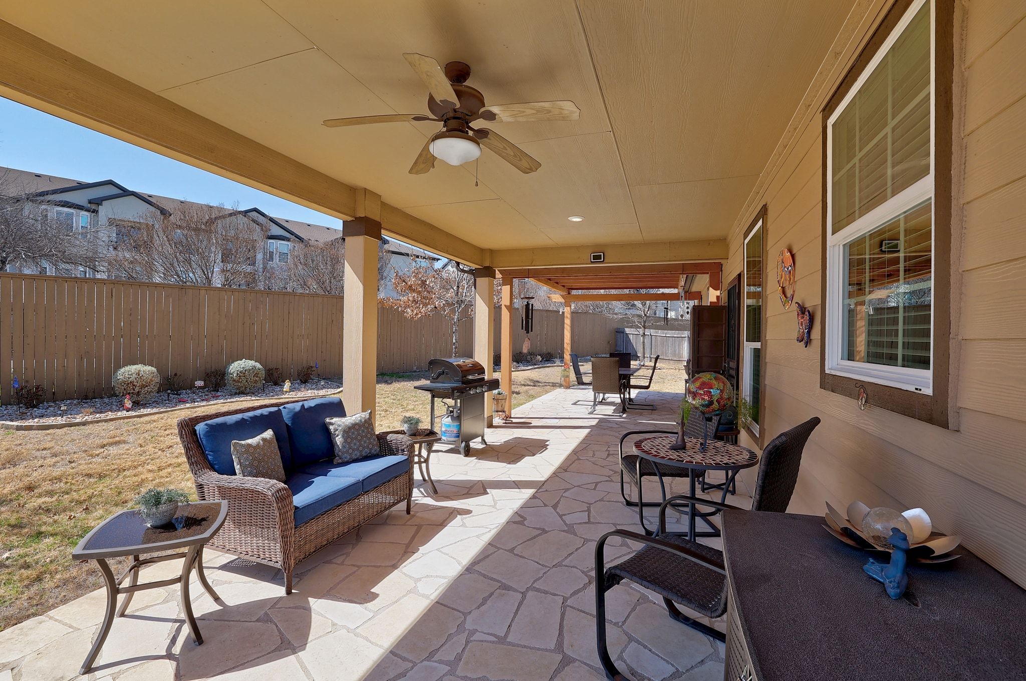 646 Landon Samuel Loop Pflugerville, TX 78660 - Photo 32 of 40 a outdoor space with patio couch and a potted plant