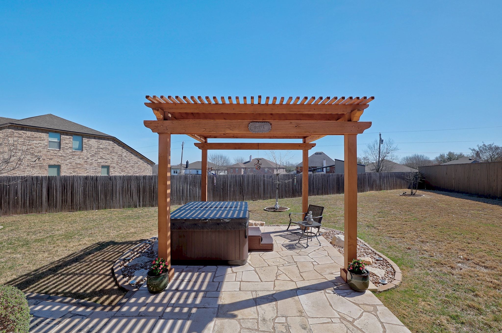 646 Landon Samuel Loop Pflugerville, TX 78660 - Photo 33 of 40 a patio with table and chairs