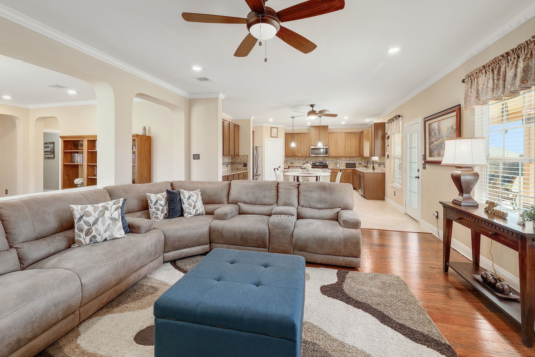 646 Landon Samuel Loop Pflugerville, TX 78660 - Photo 7 of 40 a living room with furniture and a fireplace