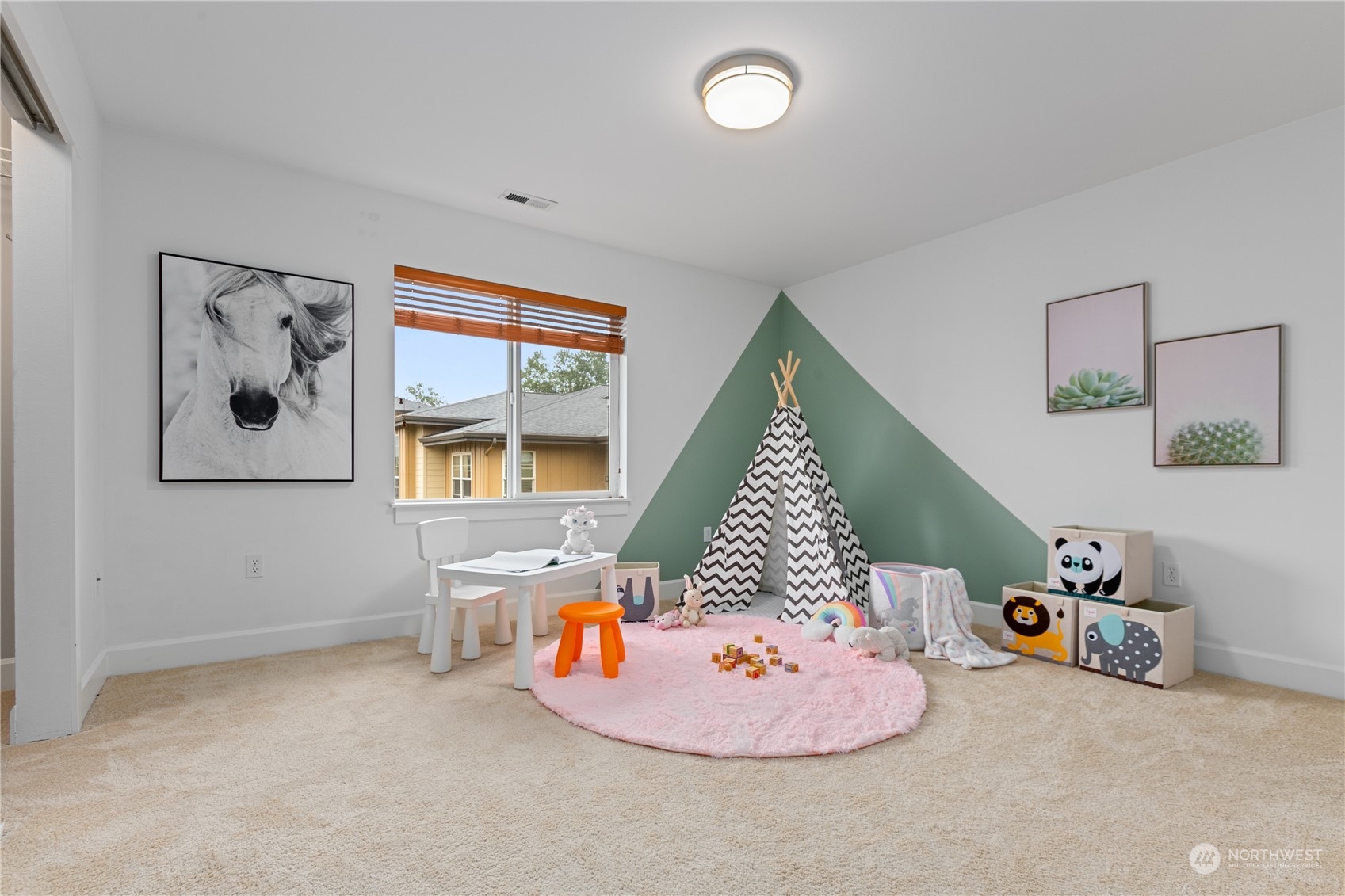 2115 201st Place Southeast, Unit D3 Bothell, WA 98012 - Photo 21 of 25 a room with toys and white walls