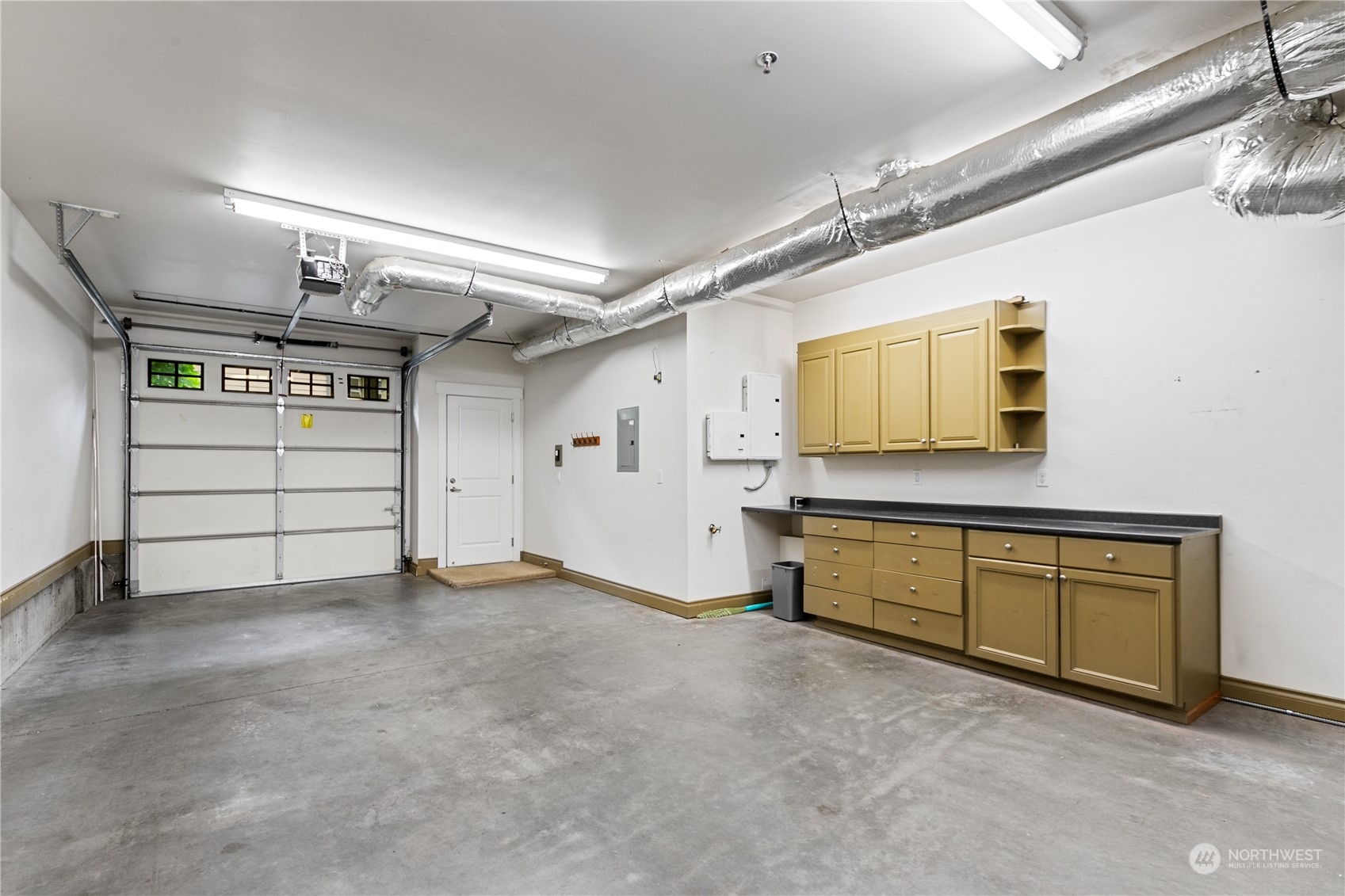 2115 201st Place Southeast, Unit D3 Bothell, WA 98012 - Photo 24 of 25 a view of a garage room