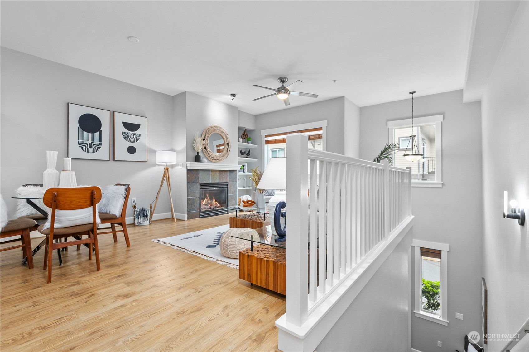2115 201st Place Southeast, Unit D3 Bothell, WA 98012 - Photo 5 of 25 a living room with furniture and a fireplace
